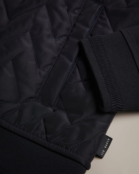 HAMSTE-Tops-Wrapping up never looked better. The HAMSTE jacket features a quilted front and funnel neck to keep out the breeze. Ideal for crisp morning walks and after work pints. Jacket Chevron quilted front Long sleeves Zip fastening Funnel neck Pockets Lewis is 6'2" / 1.88m and wears Navy in a Ted size 3- Ted Baker Romania